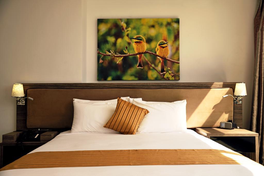 Golden Tulip Dar Es Salaam City Center Hotel Номер фото