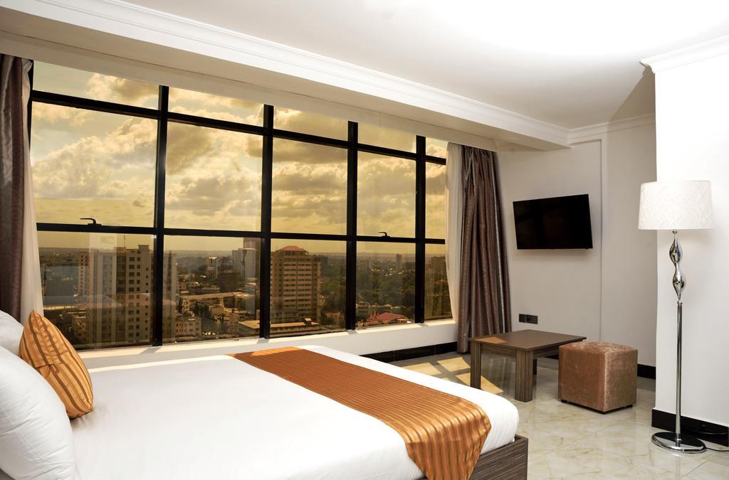 Golden Tulip Dar Es Salaam City Center Hotel Номер фото